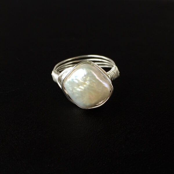 Ivory.Ring.DiamondFWPWWStSilver_BlackFront Ivory Diamond Freshwater Pearl Nested Ring on black