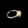 Side view of ivory diamond shaped pearl ring