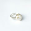 Ivory freshwater pearl ring with white background