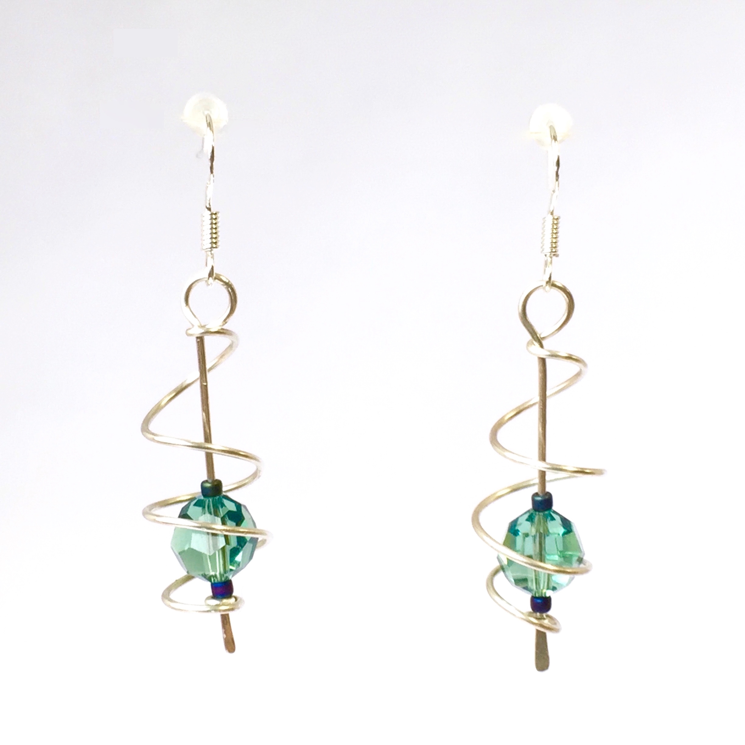 Open Spiral Cage Earrings with pale green Erinite Swarovski Crystals