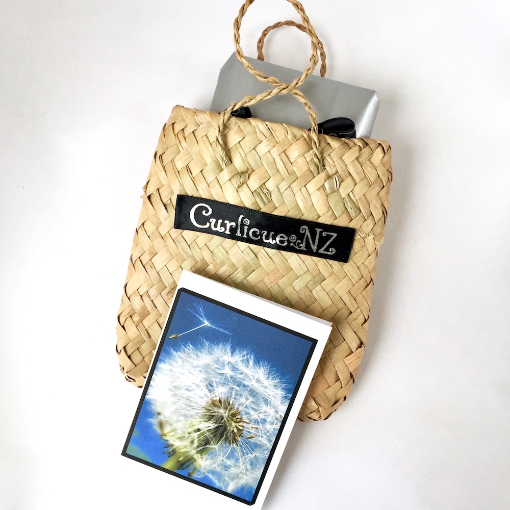 Premium Gift Wrap Service with small kete flax woven bag and handmade dandelion gift card