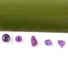 assortment of semi precious amethyst stones