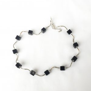 Fixed black cube and silver curved wire necklace