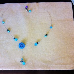 Broken blue rose beaded necklace