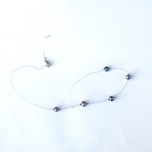 Broken floating pearl and silver wire necklace