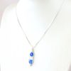 beautiful necklace on white stand showing scale great birthstone gift
