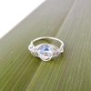 Iridescent Clear AB Swarovski Crystal used as April birthstone 'diamond' in this handmade birthstone ring in eco silver