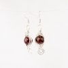 angled view of January Garnet Birthstone Earrings in Argentium Silver