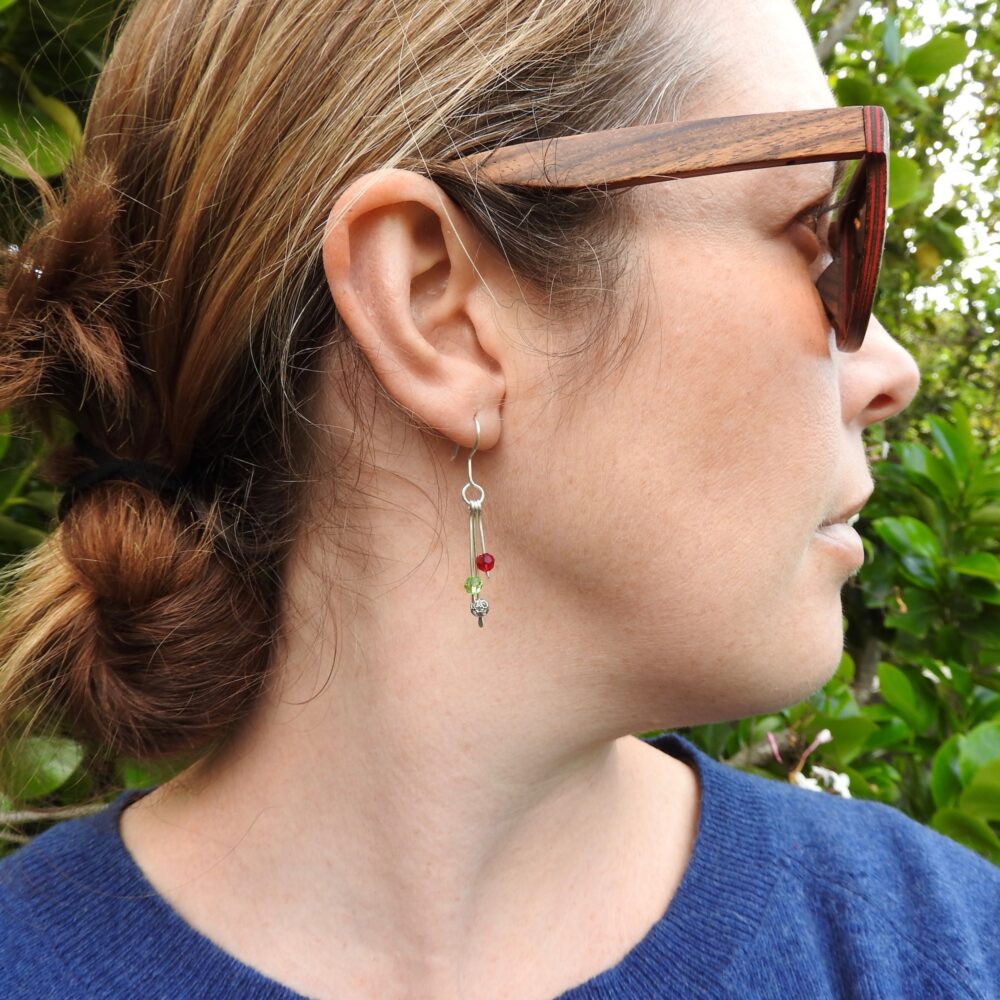 model lifestyle shot of Swarovski Christmas Drop Earrings being worn