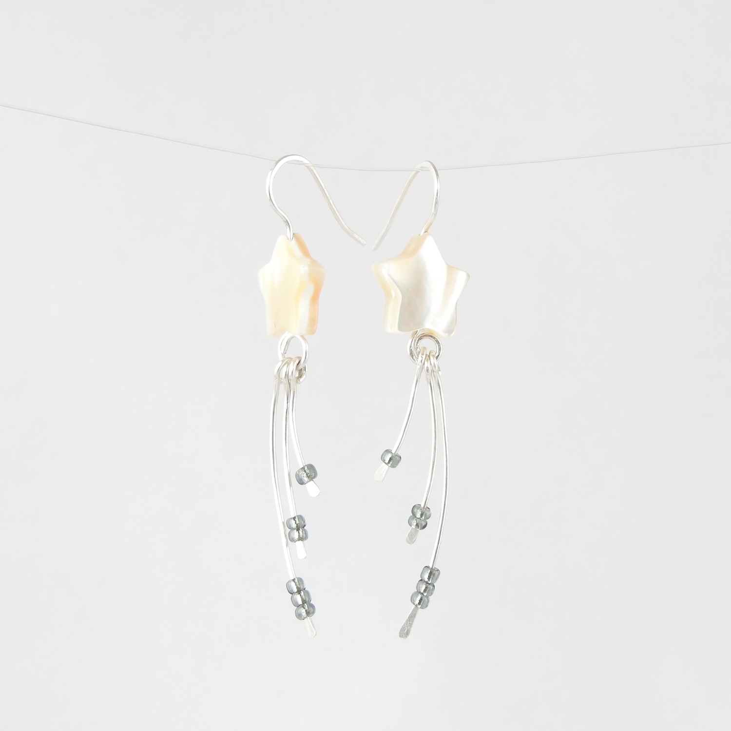 Hanging Wishing Star Earrings with Ivory Mother of Pearl star and eco silver three dangles