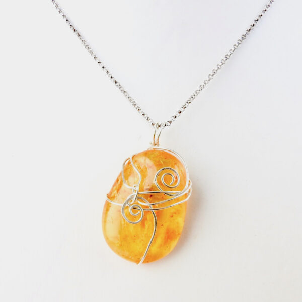 Transluscent Honey Kauri Resin Necklace with 2 koru in eco Silver
