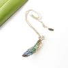Colours of the ocean are reflected in this long wedge NZ paua shell necklace
