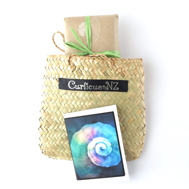 Premium gift wrapping service with wrapped parcel, homemade gift card and flax bag (kete)
