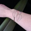 2 Leaf Cuff in sustainable silver being worn on wrist