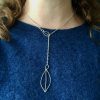 Leaf Necklace in lariat style with silver leaf pendant hanging down