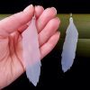NZ plastic milk bottles mean these feather earrings are translucent white in colour