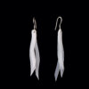 Reducing waste by repurposing plastic milk bottles into handcrafted earrings