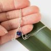 Small sized letter A necklace with blue lapis lazuli_hand scale