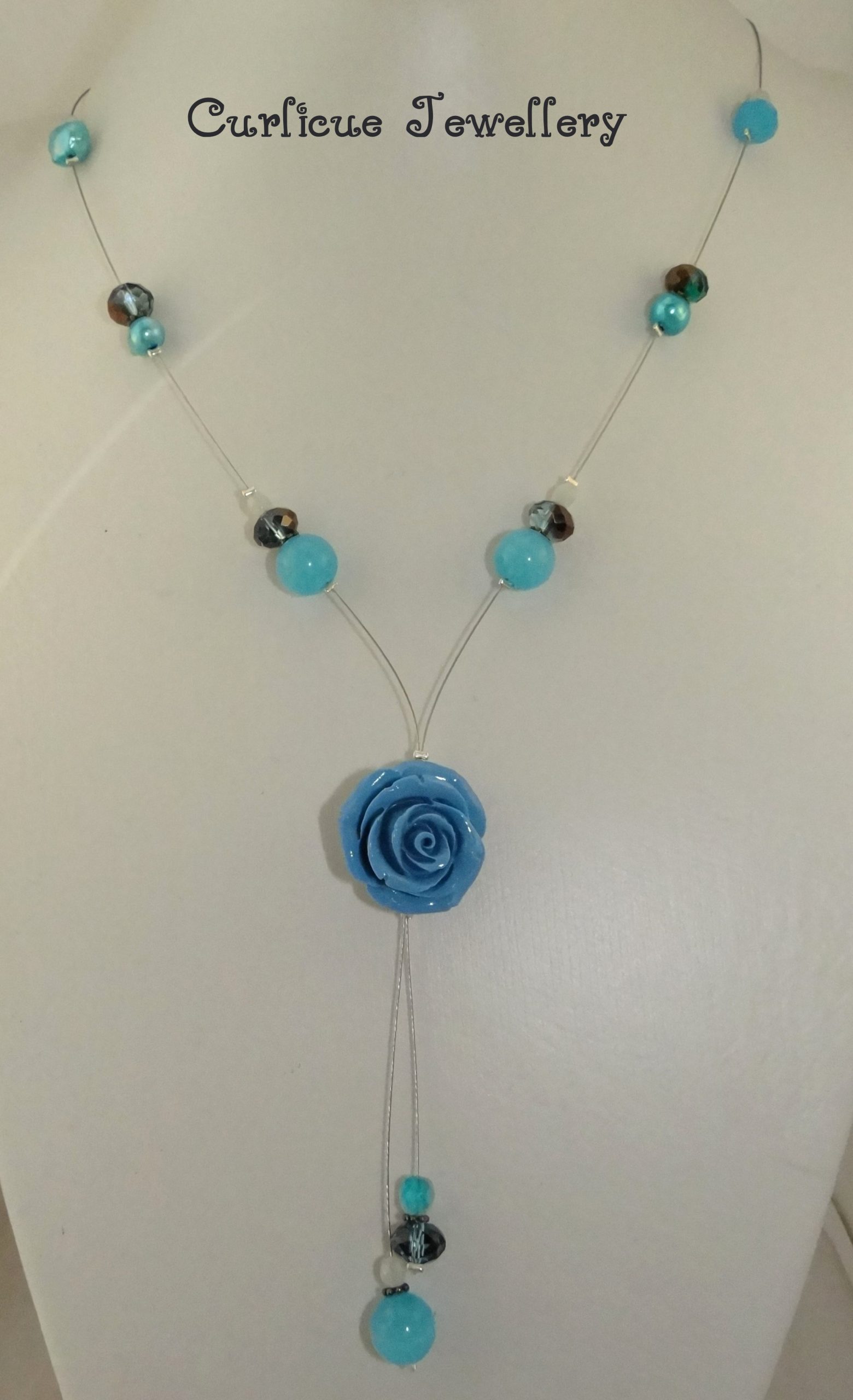Repaired blue flower beaded necklace