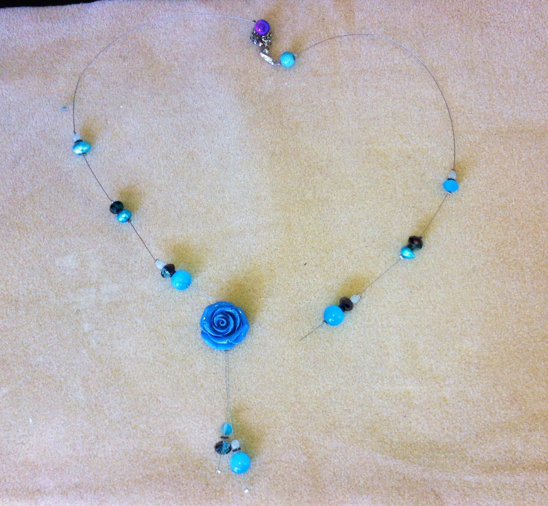 Broken Blue Flower Bead Tigertail necklace