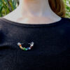 Colourful brooch being worn, perfect for PRIDE, LGBTQI+ and Chakra