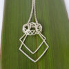 Ring Holder Necklace with ring_on flax Eco Sterling Silver Handmade Double Geometric Ring Holder Necklace - holding a ring