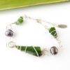SSGreenstoneFWP.Bracelet02_Front Three triangular pieces of NZ greenstone and 2 freshwater pearls spiral wrapped in sustainable silver-bracelet