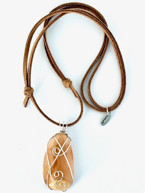 Kauri Gum Full Necklace on Caramel suede adjustable cord_white background
