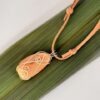 Kauri Gum necklace Close Up on Caramel suede adjustable cord_on flax